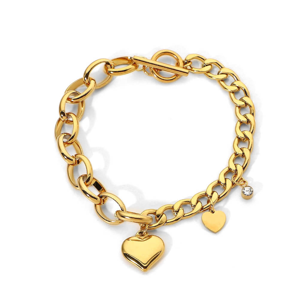 Armband med hjärthänge och oval kedja